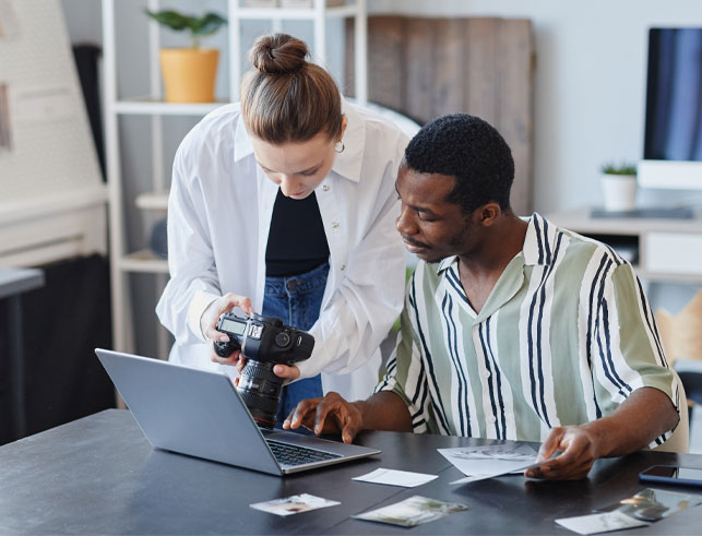 IT professionals reviewing their work